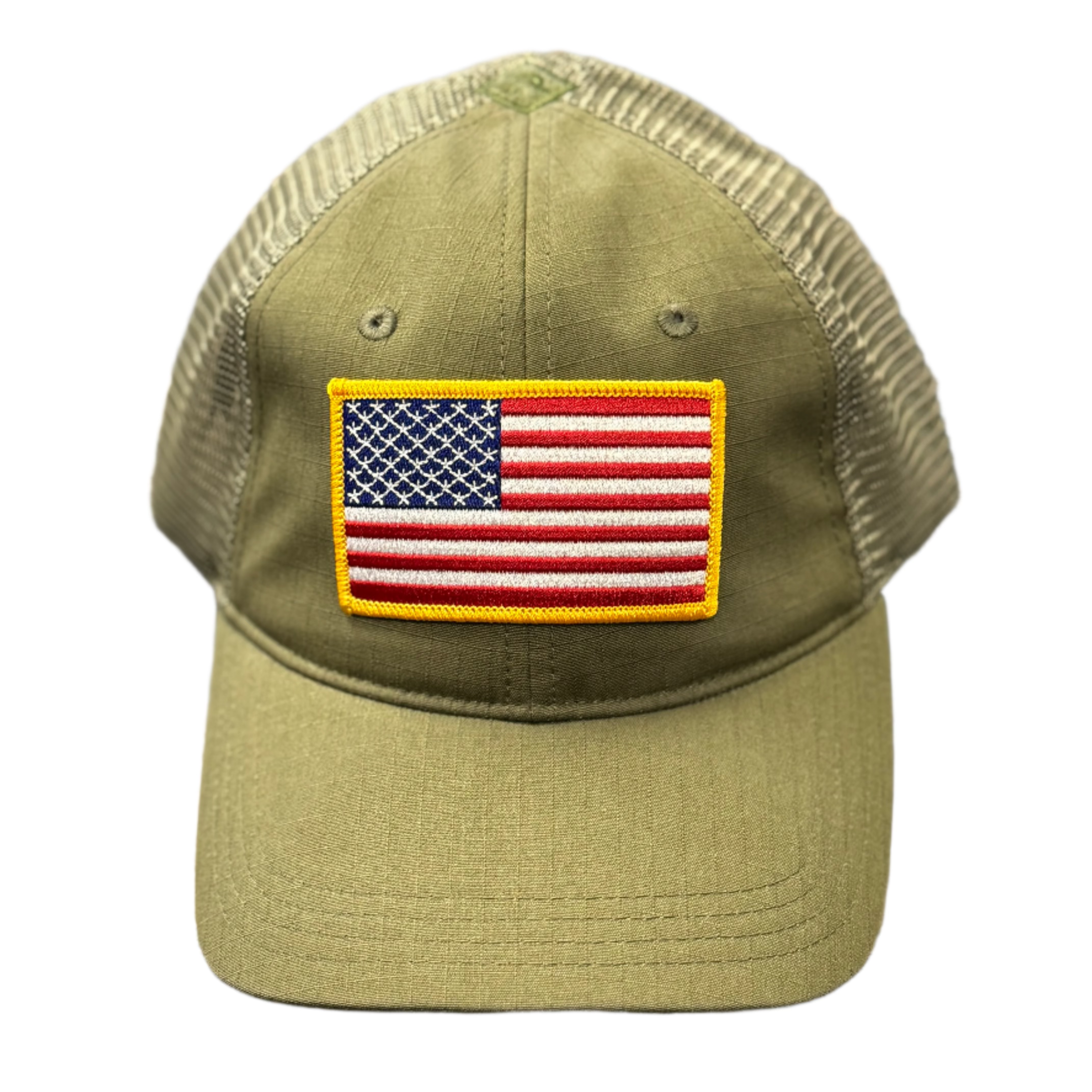 Green cap with American flag patch on a textured surface