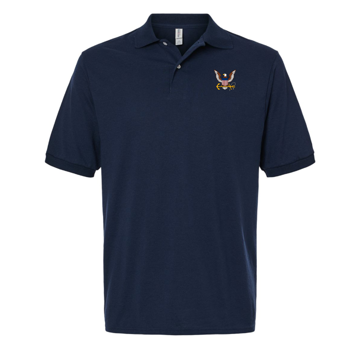 Detailed embroidered U.S. Navy logo on navy blue polo shirt.