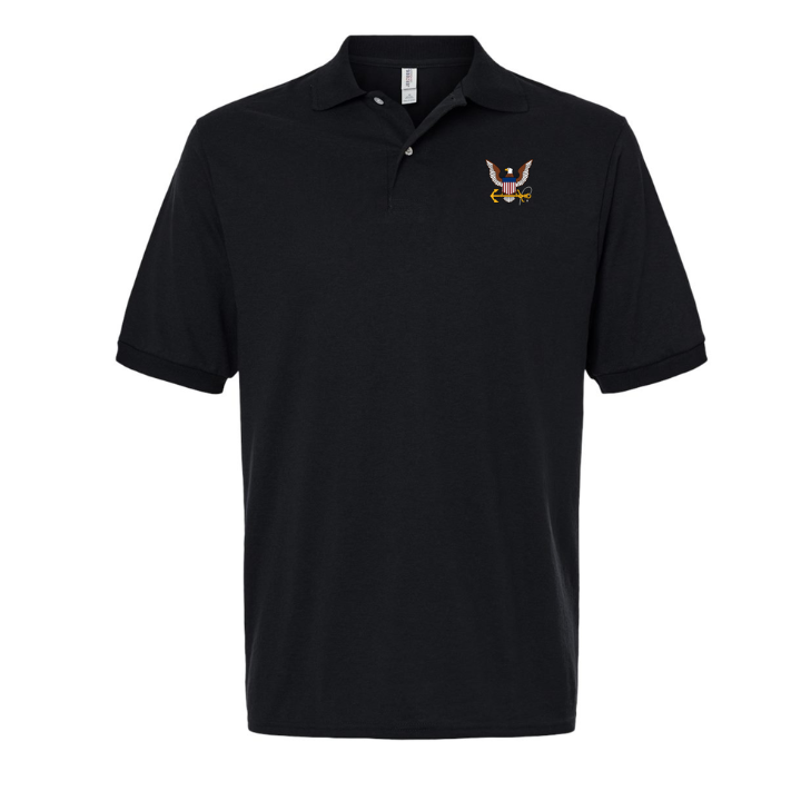 Embroidered U.S. Navy logo on black polo shirt with premium stitching detail.